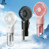 A trio of portable USB rechargeable mist fans in white, black, and pink are displayed against a snowy background.
