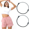 A woman models a white crop top and pink shorts while demonstrating adjustable tuck bands for clothing.