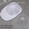 A white mesh laundry bag with a hat support, shown next to a circular silicone insert.