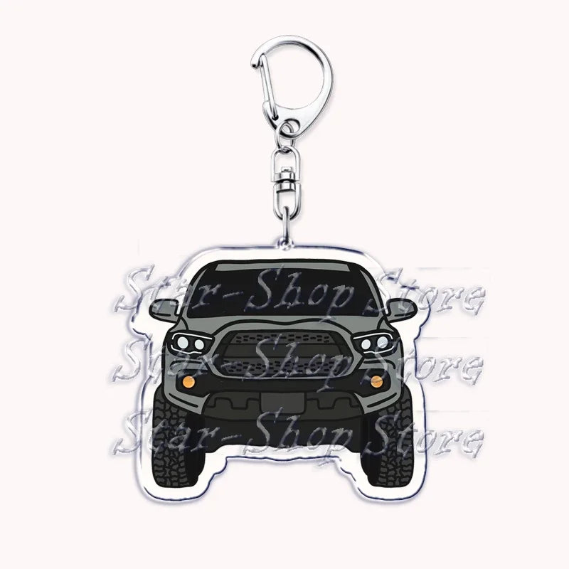 A durable metal key ring featuring an off-road truck charm.