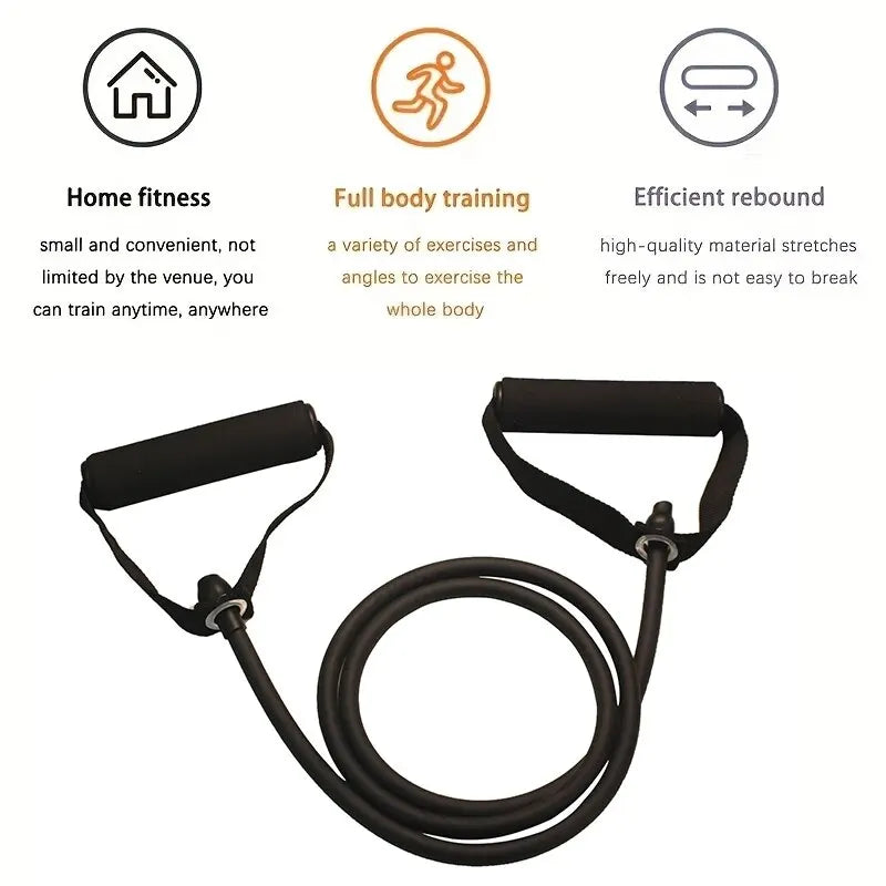 Black resistance bands with handles coiled and laid out for home fitness workouts