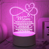 A glowing pink heart-shaped night light featuring text that reads Dear Mom and I Love You My Mom