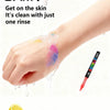 A hand is shown rinsing acrylic paint markers after use, demonstrating easy cleaning.