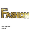 Gold sequin letter patch spelling out FASHION with black background
