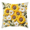 A floral cushion cover featuring yellow and white sunflowers and greenery.