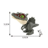 A small, gray interactive finger biting dinosaur toy featuring a Triceratops-like head and body.