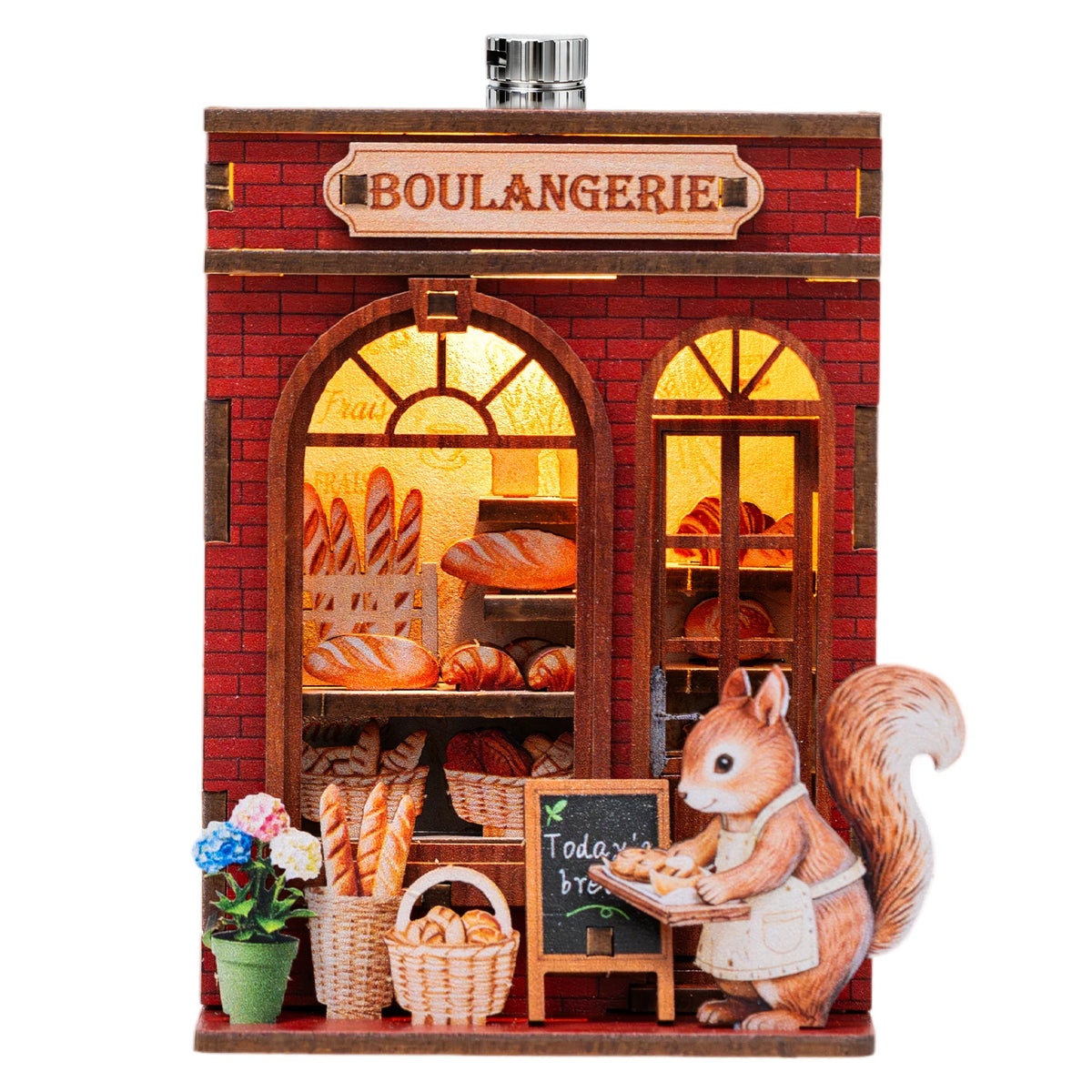 A miniature brick bakery display featuring bread and a fox figurine, part of a DIY book nook kit.