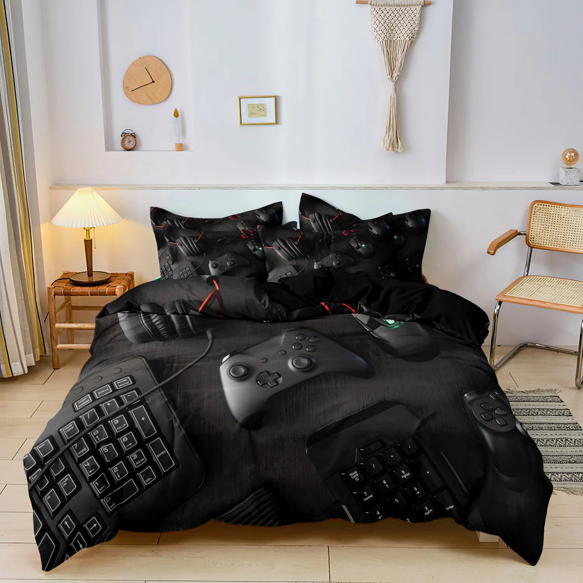 Black gamer-themed duvet cover set featuring a controller and keyboard print displayed on a bed.