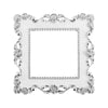 Silver resin light switch cover frame with an ornate, decorative border.