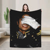 A black graphic plush throw blanket featuring a portrait of Michael Jackson with sparkling details.