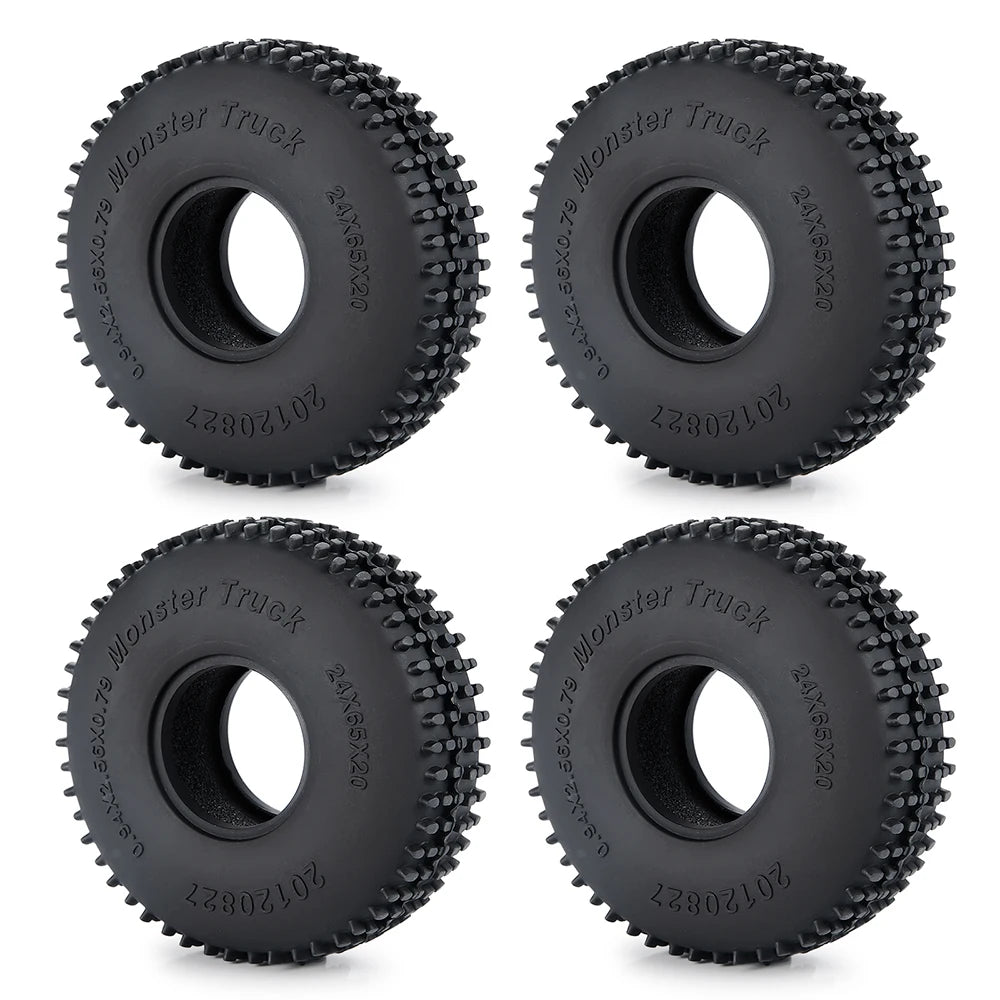 Two black Monster Truck tires for RC crawler cars shown from the top view.
