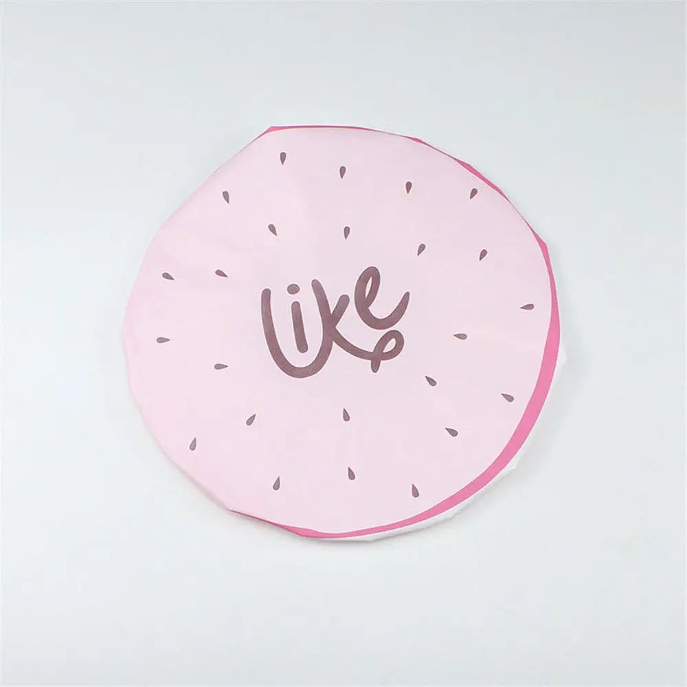 Pink fruit-design waterproof shower cap with the word like printed on it