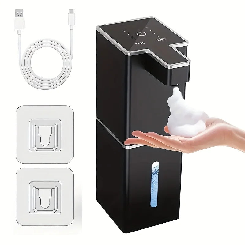 A black touchless infrared smart soap dispenser with a USB rechargeable battery and a hand dispensing soap.