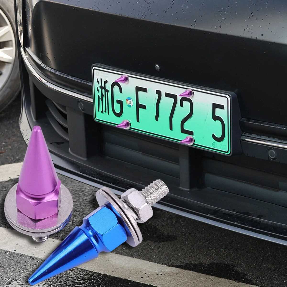 A close-up of a green license plate with characters and numbers mounted on a black car grille, next to a silver screw kit.