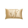 A golden satin pillowcase with a draped design.