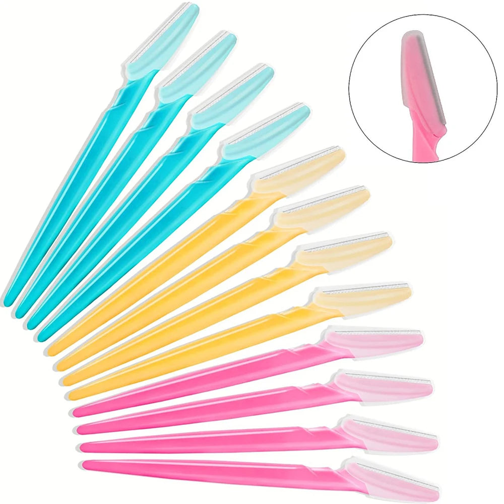A set of pink and blue precision eyebrow razors for facial grooming and dermaplaning.