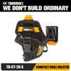 A black compact drill holster with an orange clip and bit pockets shown against a white background.