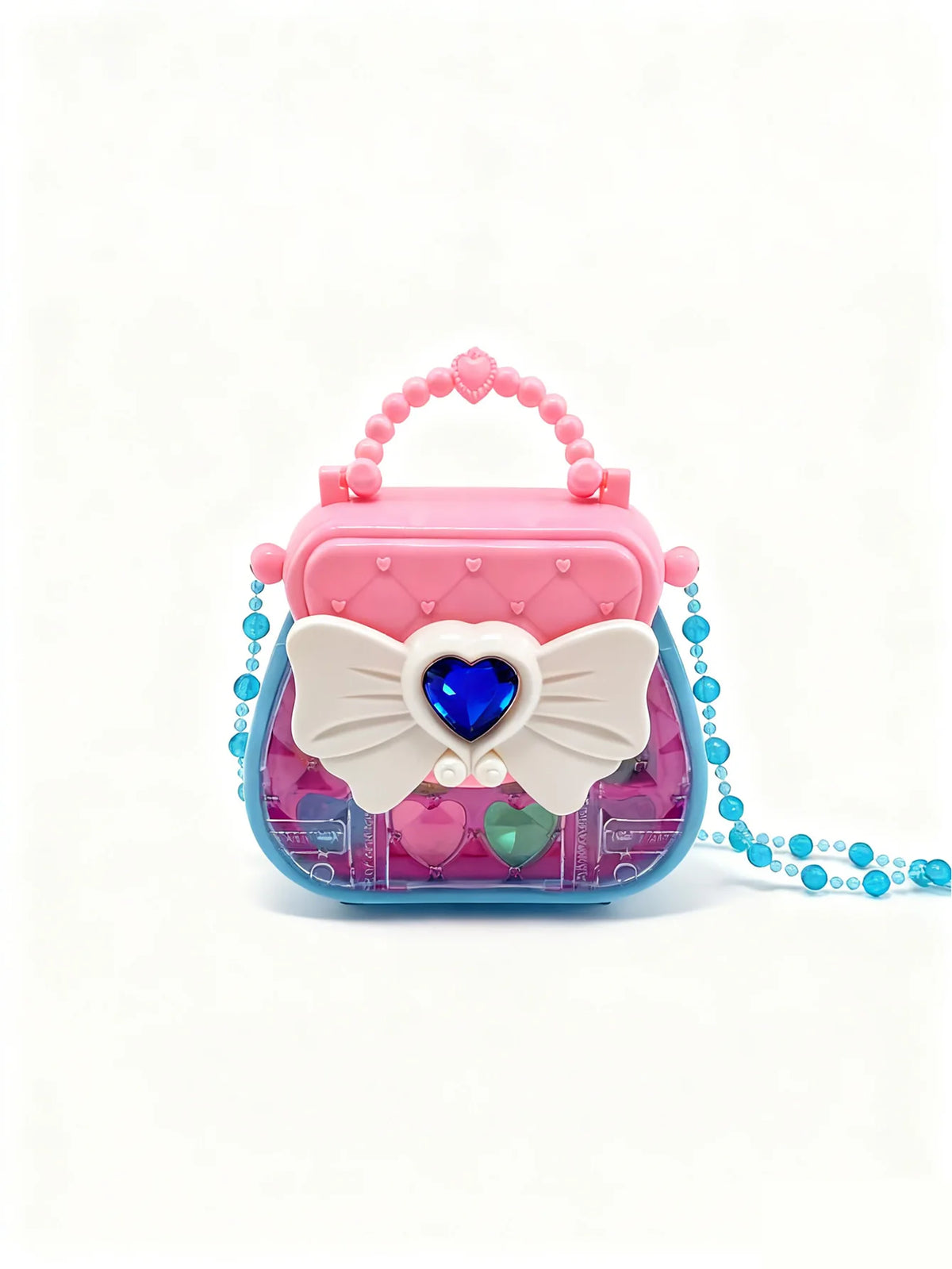 A pink and purple makeup toy set featuring a heart-shaped cosmetic case with iridescent accents and blue beads.