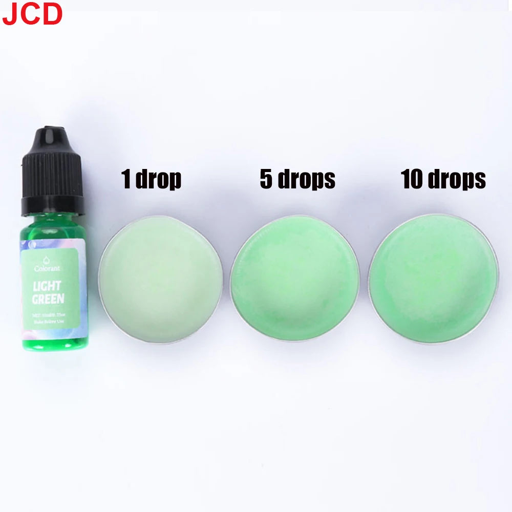A set of light green liquid candle dye in dropper bottles, showing 1, 5, and 10 drops on a white background.