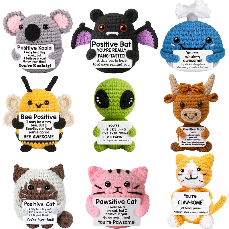 A collection of handmade crochet animal dolls featuring positive messages for Koala, Bat, Bee, Cat, and Moo.