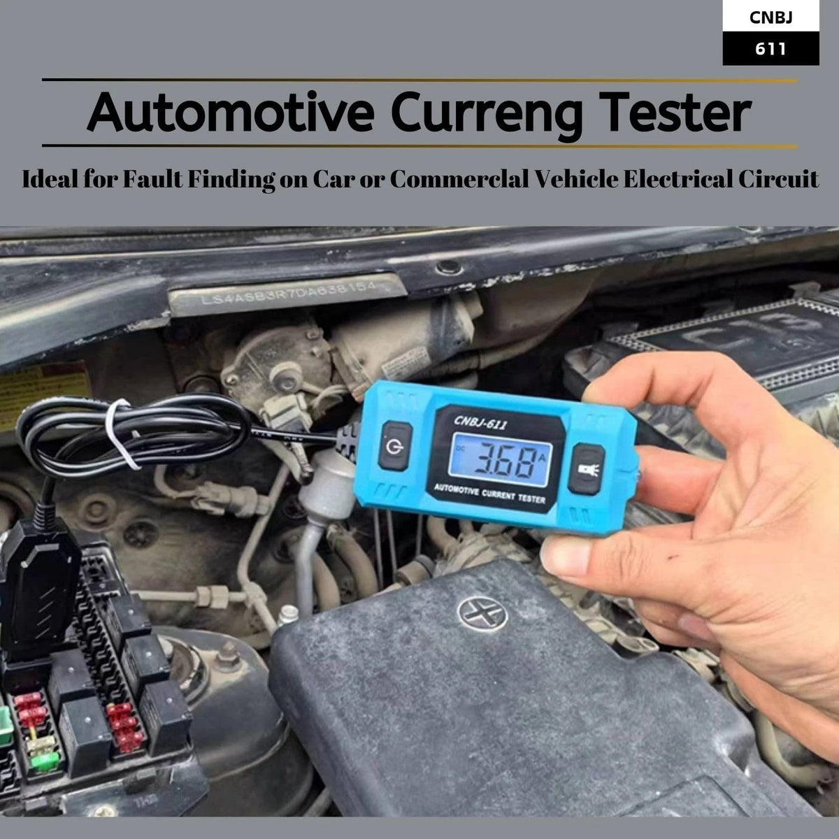 A hand holds a blue automotive current tester device near an engine component and electrical wiring.
