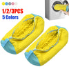 Five colorful breathable shoe washing bags with zippers shown next to a washing machine.