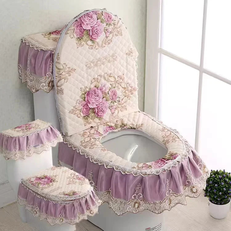 A set of antibacterial toilet seat covers featuring pink and white floral lace designs on a purple fabric cushion.