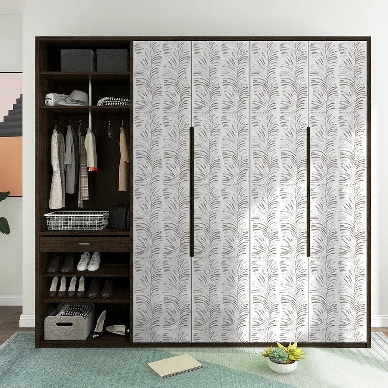 A set of modern dark wood cabinets featuring a full-length mirrored door with a green and white leaf pattern.