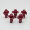 A set of five red replacement drivers for a Battling Top, used to fix or replace the top mechanism.