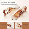 A pair of rose gold mattress lifter wedge tools showing circular handles and one-piece forming for easy bed sheet changes.