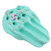 A light turquoise slime kit with colorful sprinkles and a lollipop is shown in a hand-formed shape.