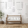A canvas wall art display featuring various aspect ratio grids and a wooden bed frame.