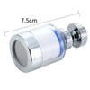 A silver faucet water purifier with a rotating head and a visible cotton filter element.