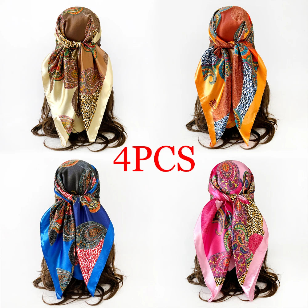 Four square scarves featuring leopard and paisley patterns in various colors like brown, orange, blue, and pink.