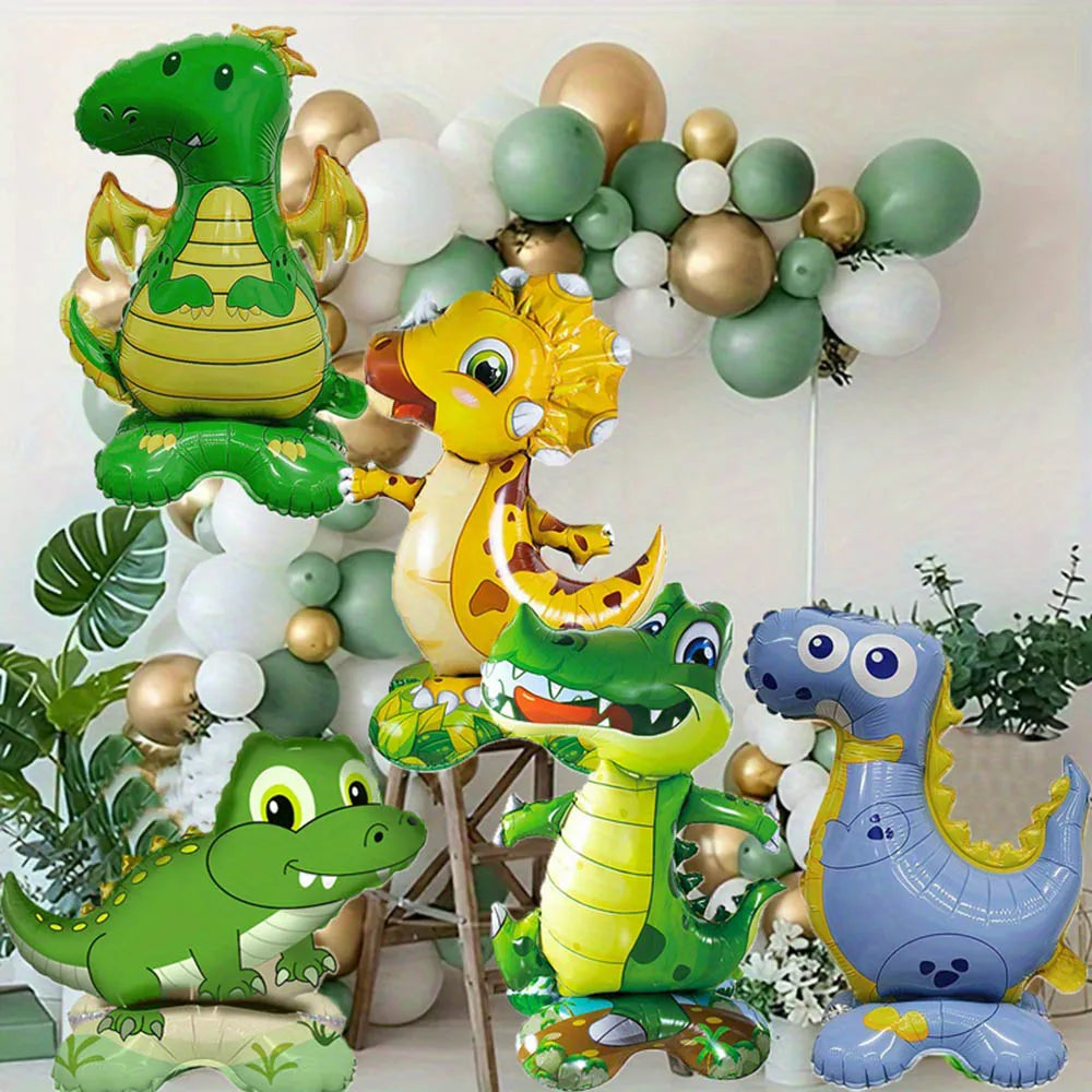 A collection of foil balloons shaped like various dinosaurs in green, yellow, and blue colors.