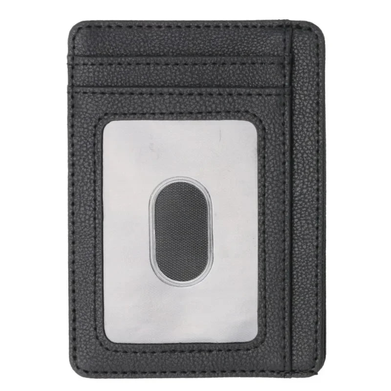 A black slim leather wallet with a clear window displaying an RFID blocking chip.