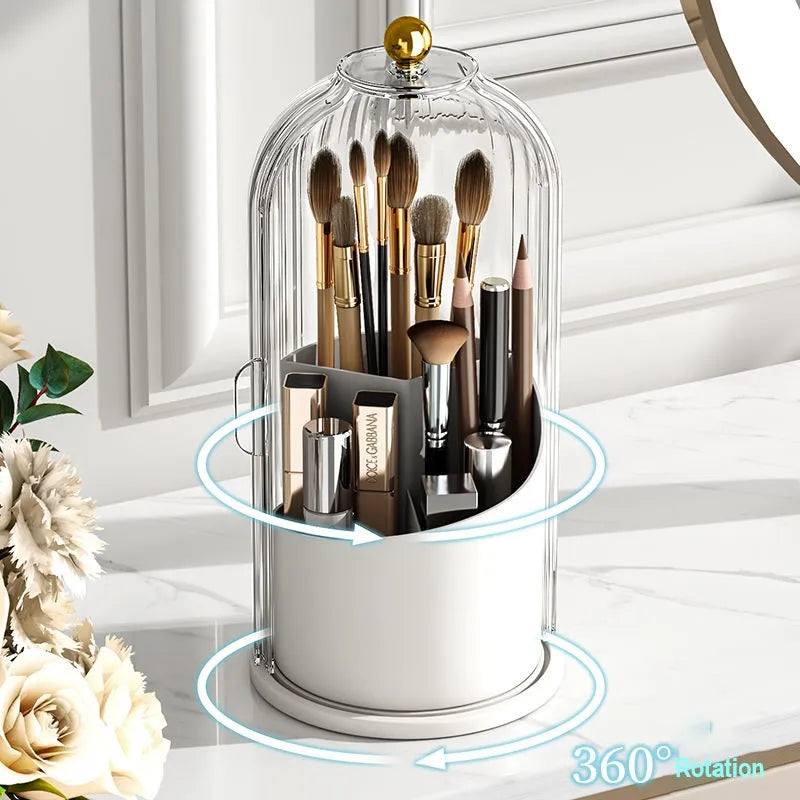 A clear glass makeup brush holder with a dustproof lid displaying various makeup brushes and tools.