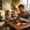 A man is using a compact hot melt glue gun and sticks to glue small wooden blocks with a young girl nearby.
