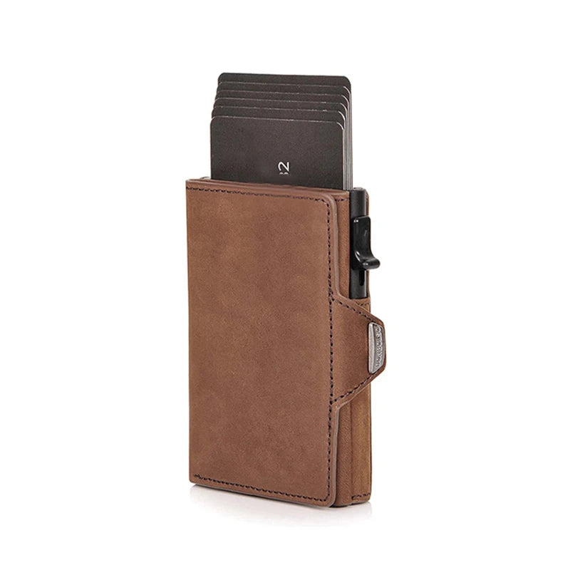A brown leather card holder wallet with a pop-up feature and a black card slot.