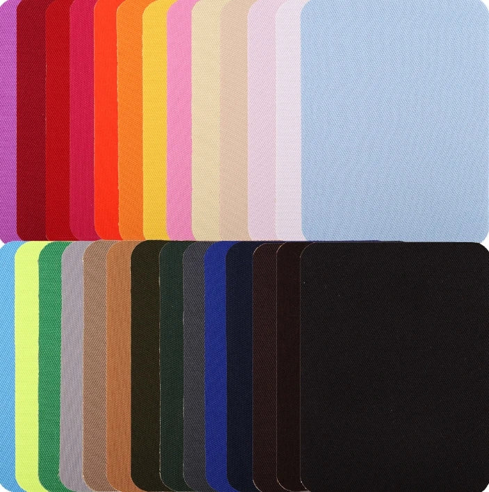 A collection of iron-on fabric patches in various shades of red, orange, yellow, pink, and blue.