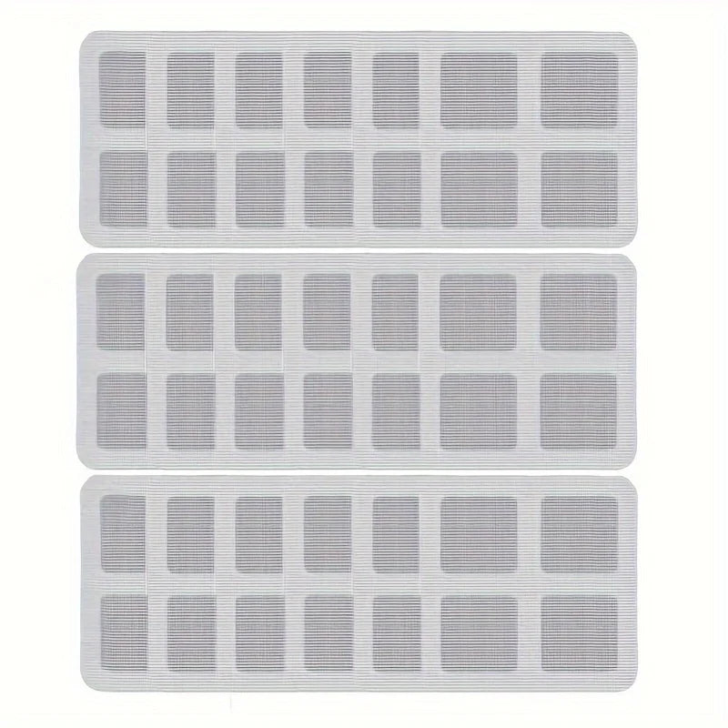A set of disposable mesh filters used as hair catchers for shower and floor drains.