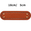 A rectangular brown PU leather oval bag bottom with multiple holes for DIY crafting projects.