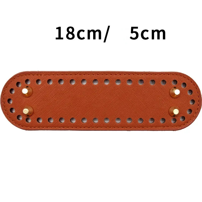 A rectangular brown PU leather oval bag bottom with multiple holes for DIY crafting projects.