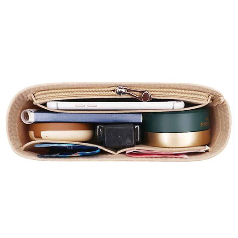 A tan felt bag organizer showing multiple internal pockets for storing various items like a phone and papers.