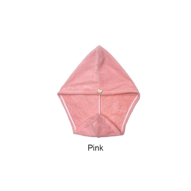 Pink quick-dry microfiber hair towel wrap folded and displayed