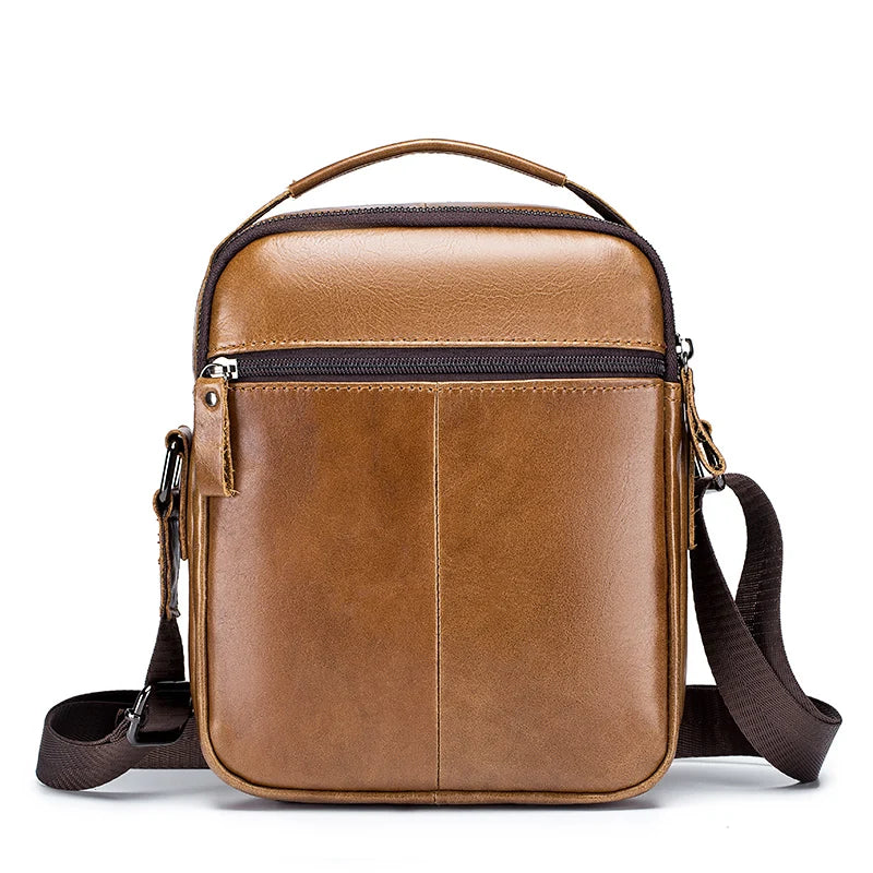 A brown men's genuine leather crossbody shoulder bag with a top handle and adjustable strap.
