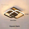 A square black modern clover LED ceiling light fixture with a white outline and 12.5cm height.
