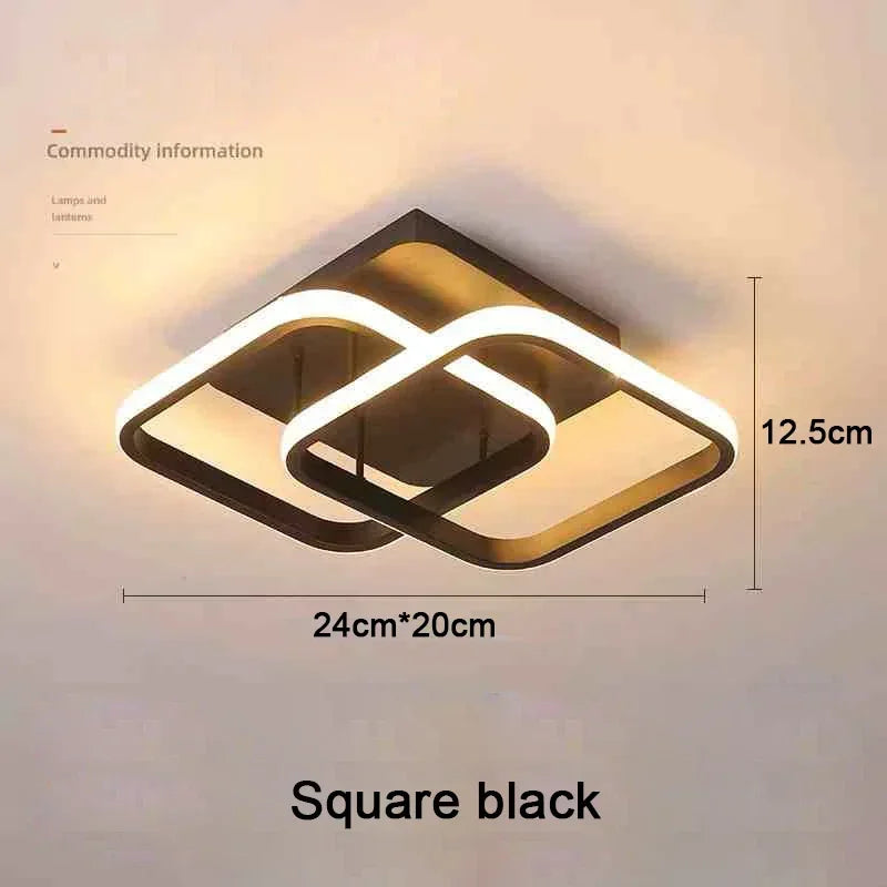 A square black modern clover LED ceiling light fixture with a white outline and 12.5cm height.