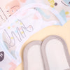 A light blue and pink waterproof long-sleeve baby bib is shown with its attached padded insert.