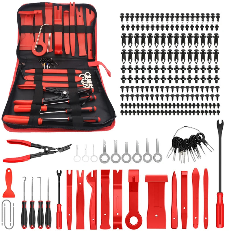 A red car trim removal tool kit with various tools and a storage pouch displayed on a white background.